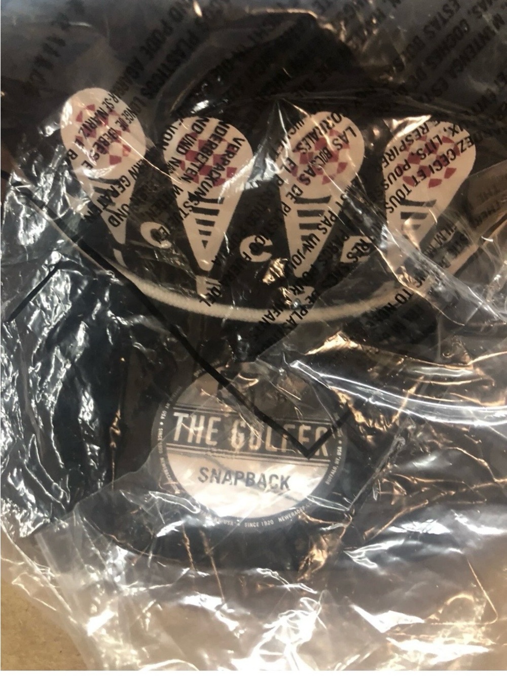 New Era Black and White Golf Snapback Hat